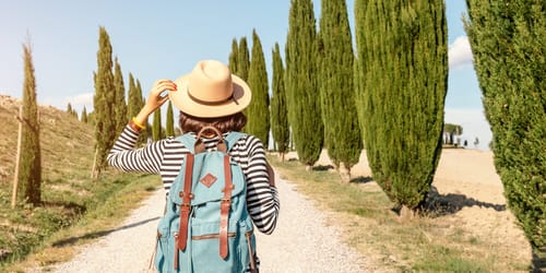 Vacation and travel in famous cypress alley, Tuscany and Italy tourist destination