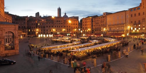 Traditional Mercato Grande, historic craft and food market on main market square ( il Campo ) in Siena, Tuscany, Italy, Europe