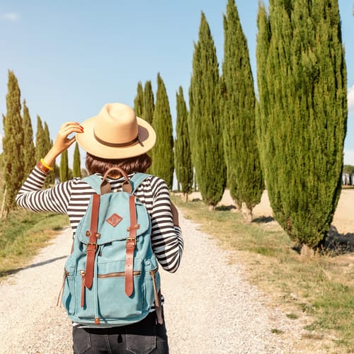 Vacation and travel in famous cypress alley, Tuscany and Italy tourist destination
