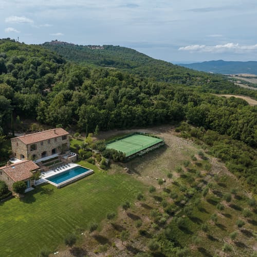 LE MACIE home, pool, tennis court, and rolling hills